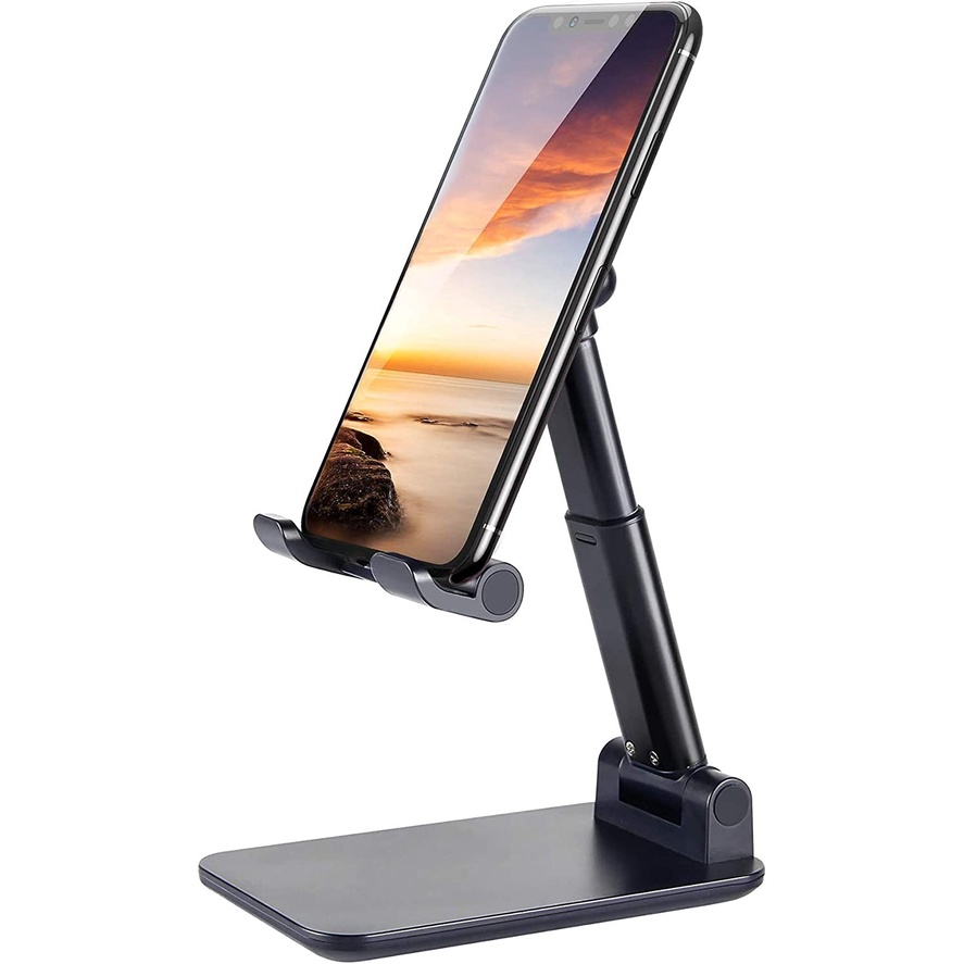 Suporte Para Celular e Tablet Dobrável Portátil Ajustável Apoio Mesa Suporte Dobrável para Celular e Tablet Portátil: Fácil de dobrar e transportar. Ajustável: Vários ângulos para visualização ideal. Estável: Base sólida e segura. Compatível: Serve para diversos dispositivos. Design Moderno: Estilo que se adapta a qualquer lugar. Ideal para quem busca praticidade e conforto ao usar dispositivos móveis